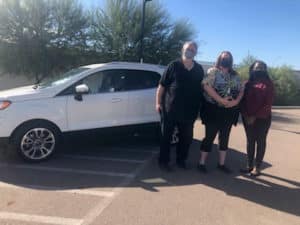 Laura, Toni and Todd with a new gifted car